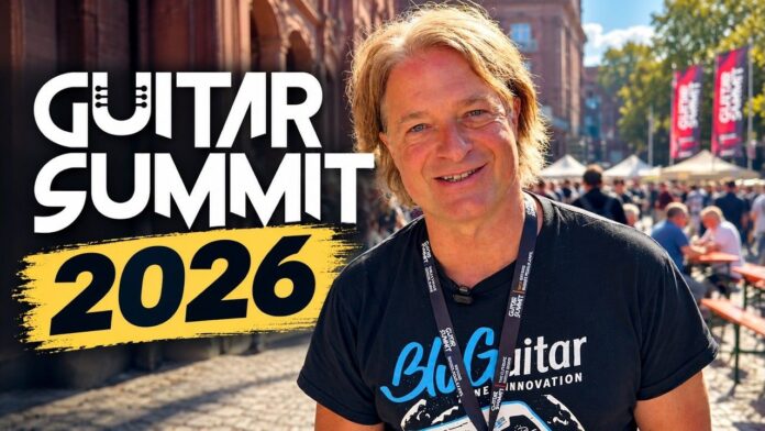 Thomas Blug vor dem Mannheimer Rosengarten mit dem Schriftzug „Guitar Summit 2026“.