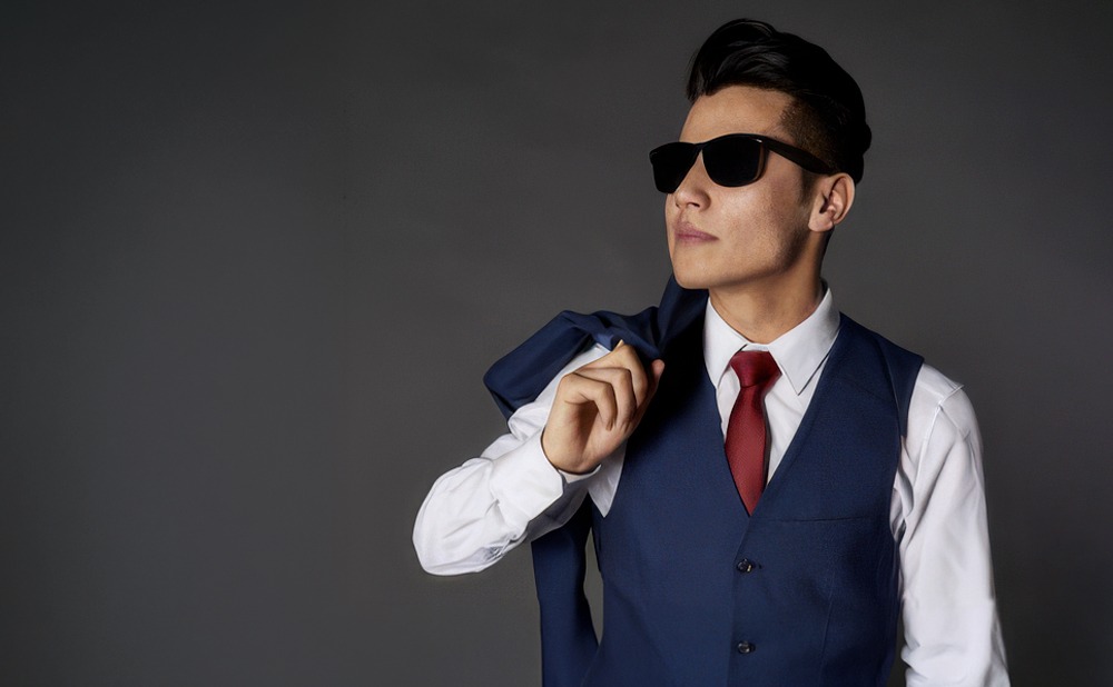 Ein teurer Anzug reicht da nicht aus – Ein Musikmanager oder Musikmanagement sollte das Business und euer Genre gut kennen &copy;&nbsp;KI-unterstützt,&nbsp;Nikolai&nbsp;Schöbel